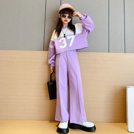 AO0508-83 طقم بناتي سبورت ( بلوزة + بنطلون)