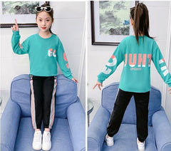 AO1023-59 طقم سبورت( بلوزة + بنطلون)