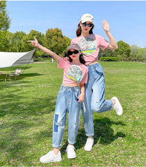 FU14042024-30 طقم بناتي قطعتين ( بلوزة قطنية + بنطلون جينز ناعم )