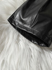 EU120424-48 طقم شورت شكل تنورة قطعتين ( بلوزة + شورت جلد )