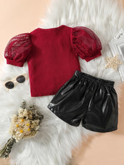 EU120424-48 طقم شورت شكل تنورة قطعتين ( بلوزة + شورت جلد )