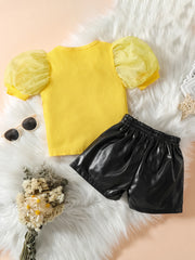 EU120424-48 طقم شورت شكل تنورة قطعتين ( بلوزة + شورت جلد )