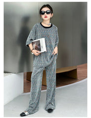 RM150424-32 طقم بناتي بلمع مزين بالبرق قطعتين ( بلوزة + بنطلون)