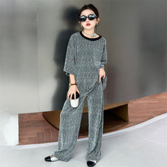 RM150424-32 طقم بناتي بلمع مزين بالبرق قطعتين ( بلوزة + بنطلون)