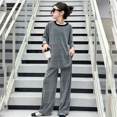 RM150424-32 طقم بناتي بلمع مزين بالبرق قطعتين ( بلوزة + بنطلون)