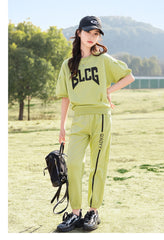 RM090424-23 طقم بناتي تريننج قطعتين ( بلوزة + بنطلون)